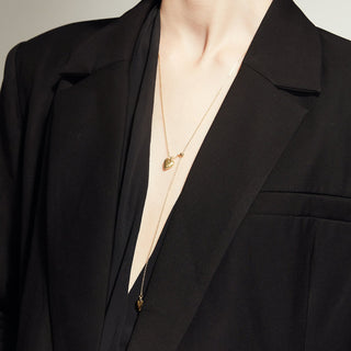 Collier avec pendentif double cœur