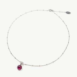 Collier avec pendentif en pierres précieuses rondes