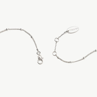 Collier avec pendentif en pierres précieuses rondes