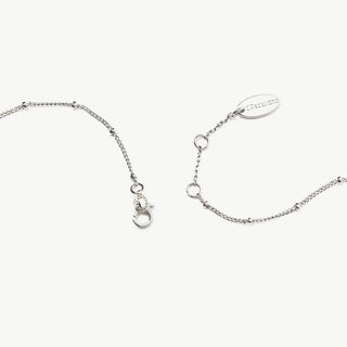 Collier avec pendentif en pierres précieuses rondes