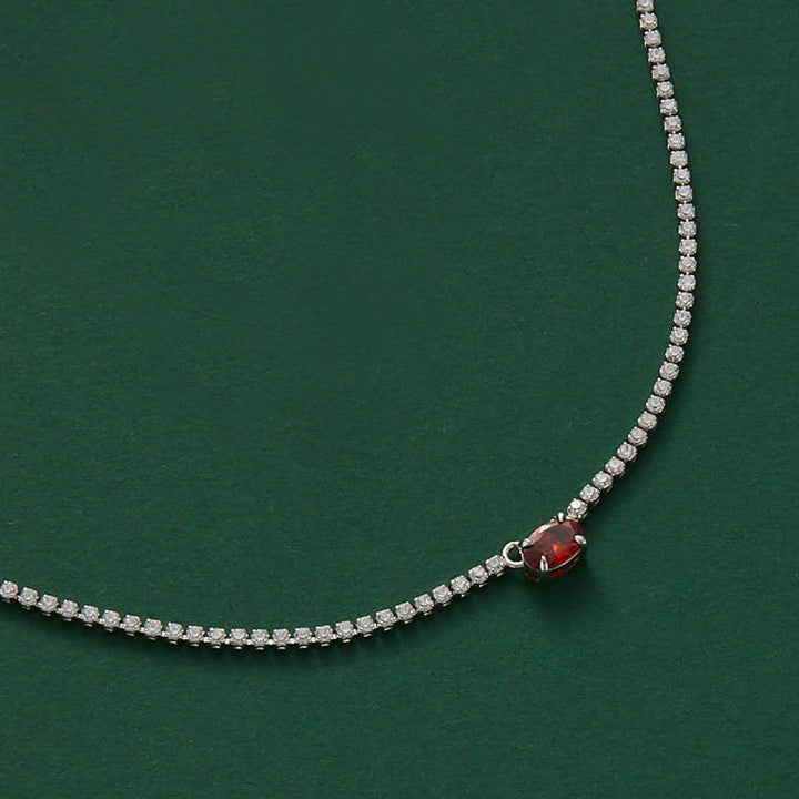 Emerald Rectangle Dewdrop Pendant, a sleek and radiant addition to your jewelry collection, showcasing an emerald rectangle dewdrop on a delicate chain, adding a touch of sophistication to your look