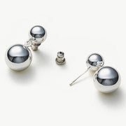  Double Sphere Hoop Earrings showcasing symmetrical spheres, creating a harmonious and sophisticated visual appeal