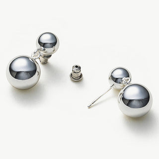  Double Sphere Hoop Earrings showcasing symmetrical spheres, creating a harmonious and sophisticated visual appeal